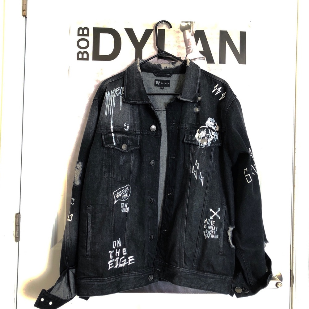 Faded black graffiti distressed jean jacket